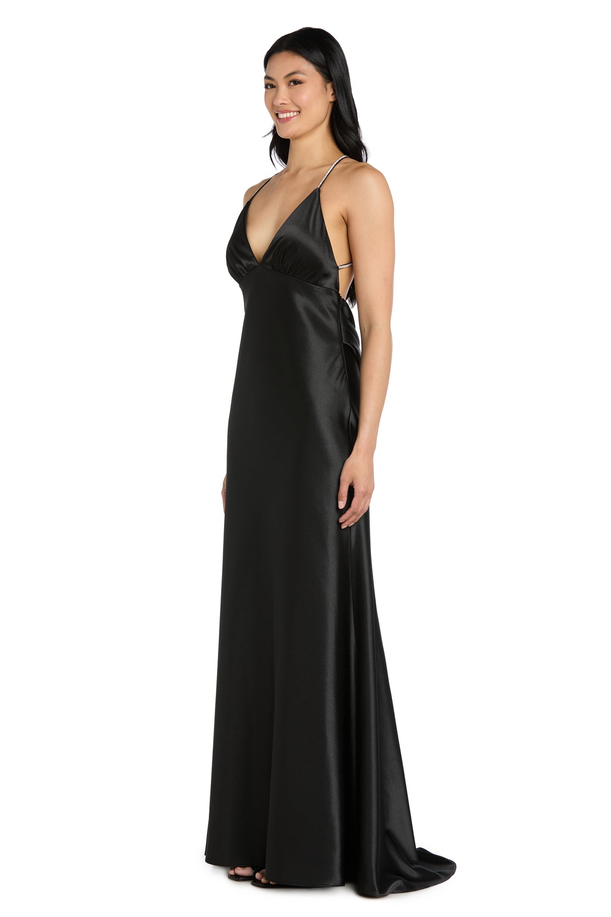 A woman models the Morgan 14011, a long black satin prom dress featuring a deep V-neckline, thin shoulder straps, and a low cowl back—a stunning choice for those seeking an elegant prom dress under $200.